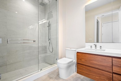 Floor-to-ceiling glass wraps this SouthEast corner penthouse on Boca Raton Resort and Club in Florida - for sale on GolfHomes.com, golf home, golf lot