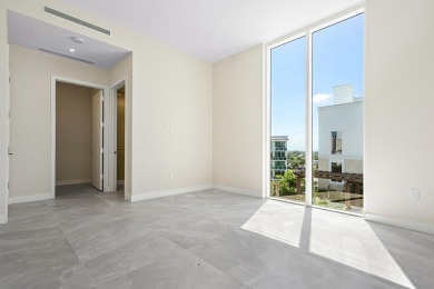 Floor-to-ceiling glass wraps this SouthEast corner penthouse on Boca Raton Resort and Club in Florida - for sale on GolfHomes.com, golf home, golf lot