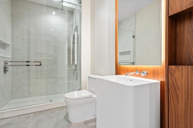 Floor-to-ceiling glass wraps this SouthEast corner penthouse on Boca Raton Resort and Club in Florida - for sale on GolfHomes.com, golf home, golf lot