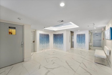 Freshly Painted, Laminate Floors Built-in Bar. Kitchen with on Boca Pointe Country Club in Florida - for sale on GolfHomes.com, golf home, golf lot