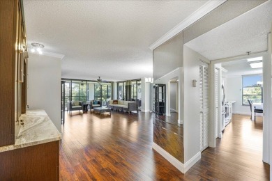 Freshly Painted, Laminate Floors Built-in Bar. Kitchen with on Boca Pointe Country Club in Florida - for sale on GolfHomes.com, golf home, golf lot