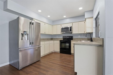 Move-in-ready Bloomingdale POOL home featuring 4 bedrooms and 2 on Bloomingdale Golfers Club in Florida - for sale on GolfHomes.com, golf home, golf lot