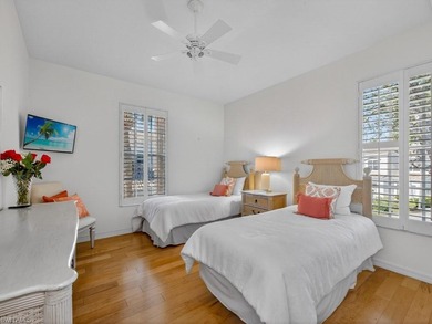 Tucked on a quiet cul-de-sac in Sandpiper Isle at Pelican on The Colony Golf and Country Club in Florida - for sale on GolfHomes.com, golf home, golf lot