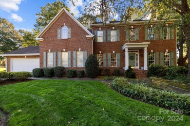 This stunning Muirfield home boasts mature trees and space for on Mooresville Golf Course in North Carolina - for sale on GolfHomes.com, golf home, golf lot