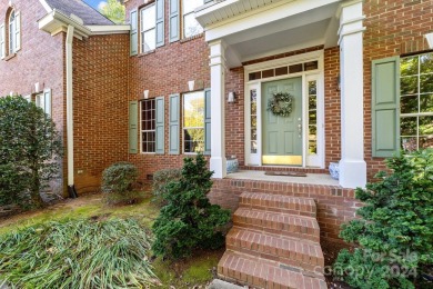 This stunning Muirfield home boasts mature trees and space for on Mooresville Golf Course in North Carolina - for sale on GolfHomes.com, golf home, golf lot