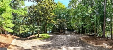 Experience ultimate privacy and breathtaking views from this on The Highlands Course at Lake Arrowhead in Georgia - for sale on GolfHomes.com, golf home, golf lot