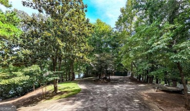 Experience ultimate privacy and breathtaking views from this on The Highlands Course at Lake Arrowhead in Georgia - for sale on GolfHomes.com, golf home, golf lot
