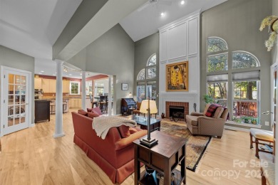 This stunning Muirfield home boasts mature trees and space for on Mooresville Golf Course in North Carolina - for sale on GolfHomes.com, golf home, golf lot