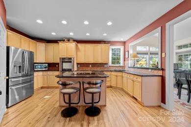 This stunning Muirfield home boasts mature trees and space for on Mooresville Golf Course in North Carolina - for sale on GolfHomes.com, golf home, golf lot