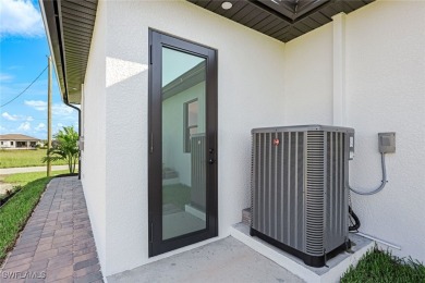 This ONE OF A KIND CUSTOM DESIGNED HOME Epitomizes Contemporary on Burnt Store Golf Club in Florida - for sale on GolfHomes.com, golf home, golf lot