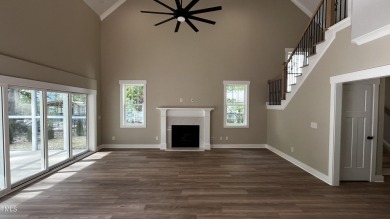 Welcome to this stunning new home nestled on a spacious, wooded on Zebulon Country Club in North Carolina - for sale on GolfHomes.com, golf home, golf lot