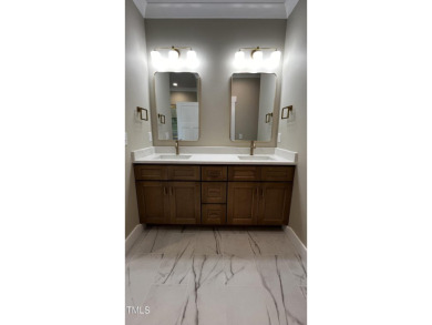 Welcome to this stunning new home nestled on a spacious, wooded on Zebulon Country Club in North Carolina - for sale on GolfHomes.com, golf home, golf lot