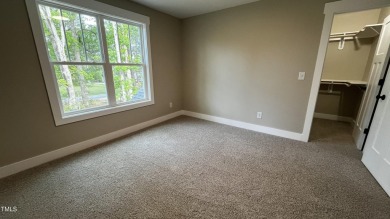 Welcome to this stunning new home nestled on a spacious, wooded on Zebulon Country Club in North Carolina - for sale on GolfHomes.com, golf home, golf lot