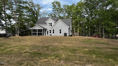 Welcome to this stunning new home nestled on a spacious, wooded on Zebulon Country Club in North Carolina - for sale on GolfHomes.com, golf home, golf lot