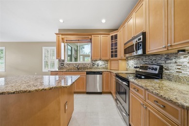 Experience golf course living at its finest on the 7th fairway on Country Club of Mount Dora in Florida - for sale on GolfHomes.com, golf home, golf lot