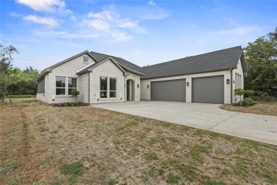 Welcome to your dream retreat in one of Lake Whitney's most on White Bluff Resort - New Course in Texas - for sale on GolfHomes.com, golf home, golf lot