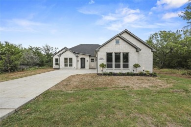 Welcome to your dream retreat in one of Lake Whitney's most on White Bluff Resort - New Course in Texas - for sale on GolfHomes.com, golf home, golf lot