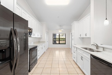 Immaculate 3 bedroom, 2 bath home in the desirable Lexington on Heritage Ridge Golf Club in Florida - for sale on GolfHomes.com, golf home, golf lot