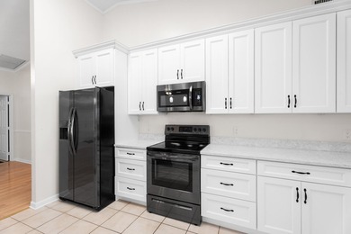 Immaculate 3 bedroom, 2 bath home in the desirable Lexington on Heritage Ridge Golf Club in Florida - for sale on GolfHomes.com, golf home, golf lot