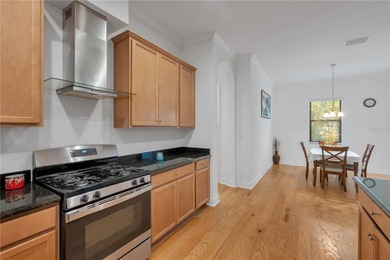 Tucked inside the tranquil and golf-cart-friendly community of on The Golf Club of Cypress Creek in Florida - for sale on GolfHomes.com, golf home, golf lot