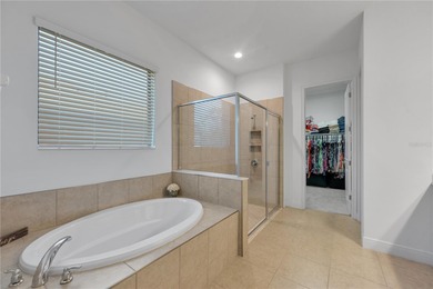 Tucked inside the tranquil and golf-cart-friendly community of on The Golf Club of Cypress Creek in Florida - for sale on GolfHomes.com, golf home, golf lot