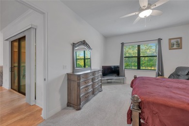 Tucked inside the tranquil and golf-cart-friendly community of on The Golf Club of Cypress Creek in Florida - for sale on GolfHomes.com, golf home, golf lot