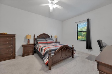 Tucked inside the tranquil and golf-cart-friendly community of on The Golf Club of Cypress Creek in Florida - for sale on GolfHomes.com, golf home, golf lot