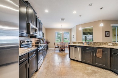 Under contract-accepting backup offers. STUNNING 2015 K on Tampa Bay Golf and Country Club in Florida - for sale on GolfHomes.com, golf home, golf lot