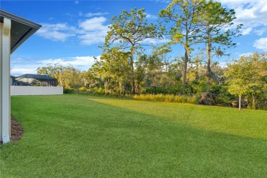 Tucked inside the tranquil and golf-cart-friendly community of on The Golf Club of Cypress Creek in Florida - for sale on GolfHomes.com, golf home, golf lot