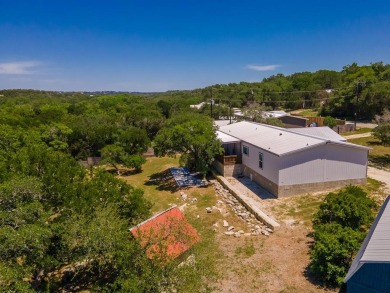 RIVERFRONT PROPERTY, NEW MANFACUTURED HOME, TWO 1 BEDROOM WITH on Rebecca Creek Golf Club in Texas - for sale on GolfHomes.com, golf home, golf lot