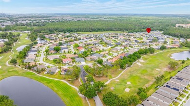 Tucked inside the tranquil and golf-cart-friendly community of on The Golf Club of Cypress Creek in Florida - for sale on GolfHomes.com, golf home, golf lot