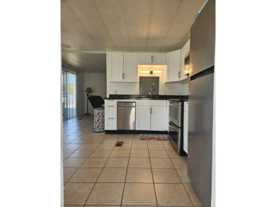 This worry-free, renovated 2-bedroom, 2-bath home, in the heart on The Links Golf Course in Florida - for sale on GolfHomes.com, golf home, golf lot