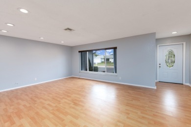 GORGEOUS, UPDATED, SKYLIGHTS, FANS, FRESHLY PAINTED, SCREENED on Forest Oaks Golf Club in Florida - for sale on GolfHomes.com, golf home, golf lot