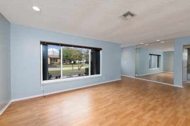 GORGEOUS, UPDATED, SKYLIGHTS, FANS, FRESHLY PAINTED, SCREENED on Forest Oaks Golf Club in Florida - for sale on GolfHomes.com, golf home, golf lot