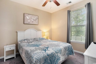 This bright 2 bedroom, 2 bath end unit in the desirable River on River Oaks Golf Plantation  in South Carolina - for sale on GolfHomes.com, golf home, golf lot
