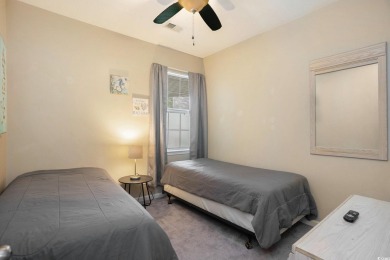This bright 2 bedroom, 2 bath end unit in the desirable River on River Oaks Golf Plantation  in South Carolina - for sale on GolfHomes.com, golf home, golf lot