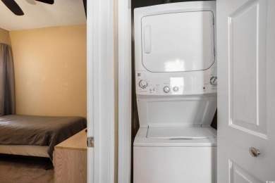This bright 2 bedroom, 2 bath end unit in the desirable River on River Oaks Golf Plantation  in South Carolina - for sale on GolfHomes.com, golf home, golf lot