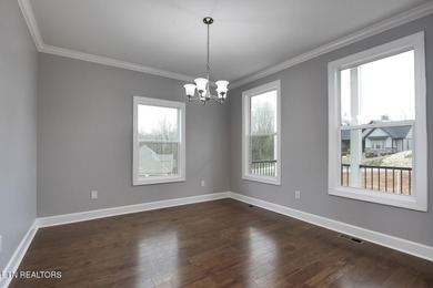 Located on a professionally landscaped corner lot in Tellico on Toqua Golf Course - Loudon County in Tennessee - for sale on GolfHomes.com, golf home, golf lot