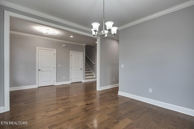 Located on a professionally landscaped corner lot in Tellico on Toqua Golf Course - Loudon County in Tennessee - for sale on GolfHomes.com, golf home, golf lot