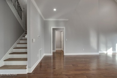 Located on a professionally landscaped corner lot in Tellico on Toqua Golf Course - Loudon County in Tennessee - for sale on GolfHomes.com, golf home, golf lot