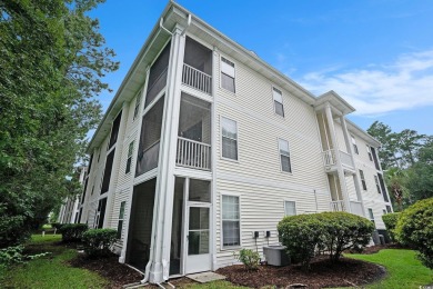 This bright 2 bedroom, 2 bath end unit in the desirable River on River Oaks Golf Plantation  in South Carolina - for sale on GolfHomes.com, golf home, golf lot