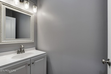 Located on a professionally landscaped corner lot in Tellico on Toqua Golf Course - Loudon County in Tennessee - for sale on GolfHomes.com, golf home, golf lot