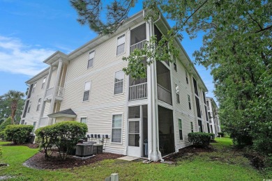 This bright 2 bedroom, 2 bath end unit in the desirable River on River Oaks Golf Plantation  in South Carolina - for sale on GolfHomes.com, golf home, golf lot