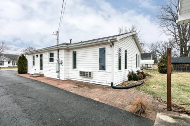 Here's an adorable home nestled right next to the on Lebanon Country Club in Kentucky - for sale on GolfHomes.com, golf home, golf lot