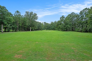 This bright 2 bedroom, 2 bath end unit in the desirable River on River Oaks Golf Plantation  in South Carolina - for sale on GolfHomes.com, golf home, golf lot