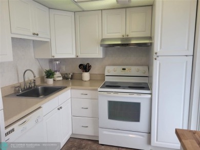 ***Lovely and cozy 2nd Floor unit overlooking serene views of on Palm-Aire Country Club and Resort - Palms in Florida - for sale on GolfHomes.com, golf home, golf lot