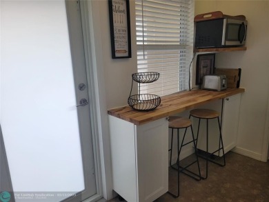 ***Lovely and cozy 2nd Floor unit overlooking serene views of on Palm-Aire Country Club and Resort - Palms in Florida - for sale on GolfHomes.com, golf home, golf lot