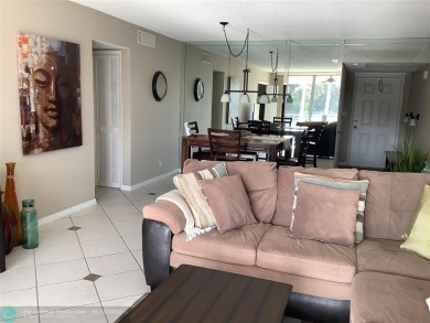 ***Lovely and cozy 2nd Floor unit overlooking serene views of on Palm-Aire Country Club and Resort - Palms in Florida - for sale on GolfHomes.com, golf home, golf lot