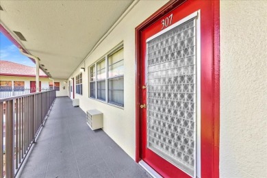 This charming 1-bedroom, 1-bathroom unit is filled with natural on Flamingo Lakes Country Club in Florida - for sale on GolfHomes.com, golf home, golf lot