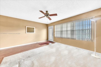 This charming 1-bedroom, 1-bathroom unit is filled with natural on Flamingo Lakes Country Club in Florida - for sale on GolfHomes.com, golf home, golf lot